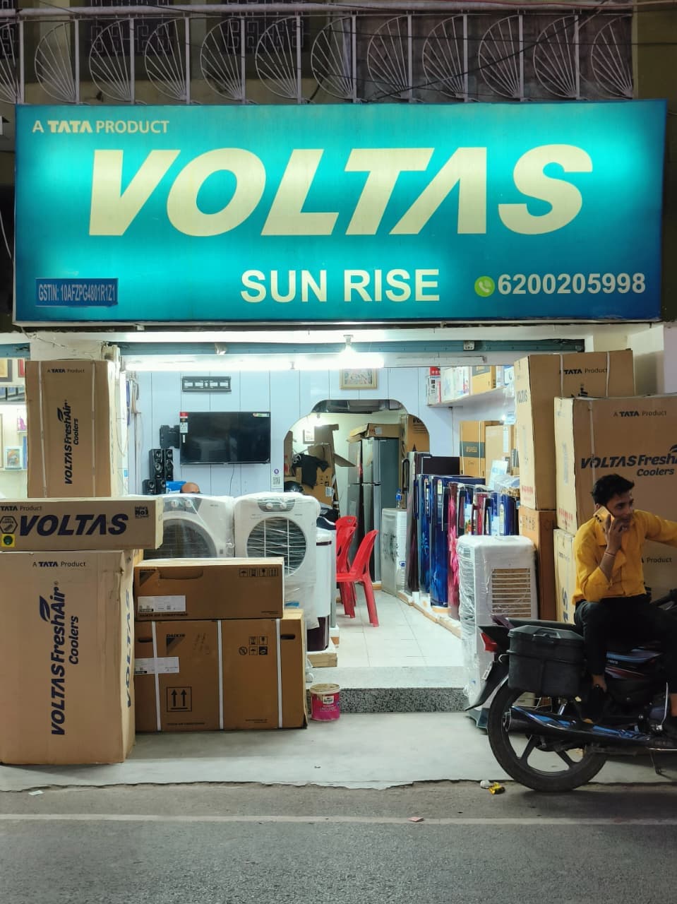 A collage of modern home appliances like a refrigerator, washing machine, and television.